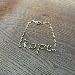 Gold hope bracelet with clasp